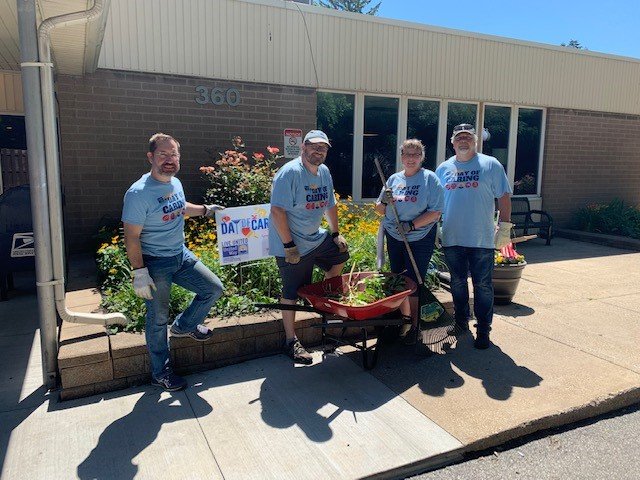 AMETEK Advanced Motion Solutions employees complete gardening tasks as a part of the United Way Day of Caring